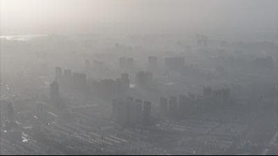 专家：扬沙浮尘天气是内蒙古甘肃宁夏发展的"副产品"